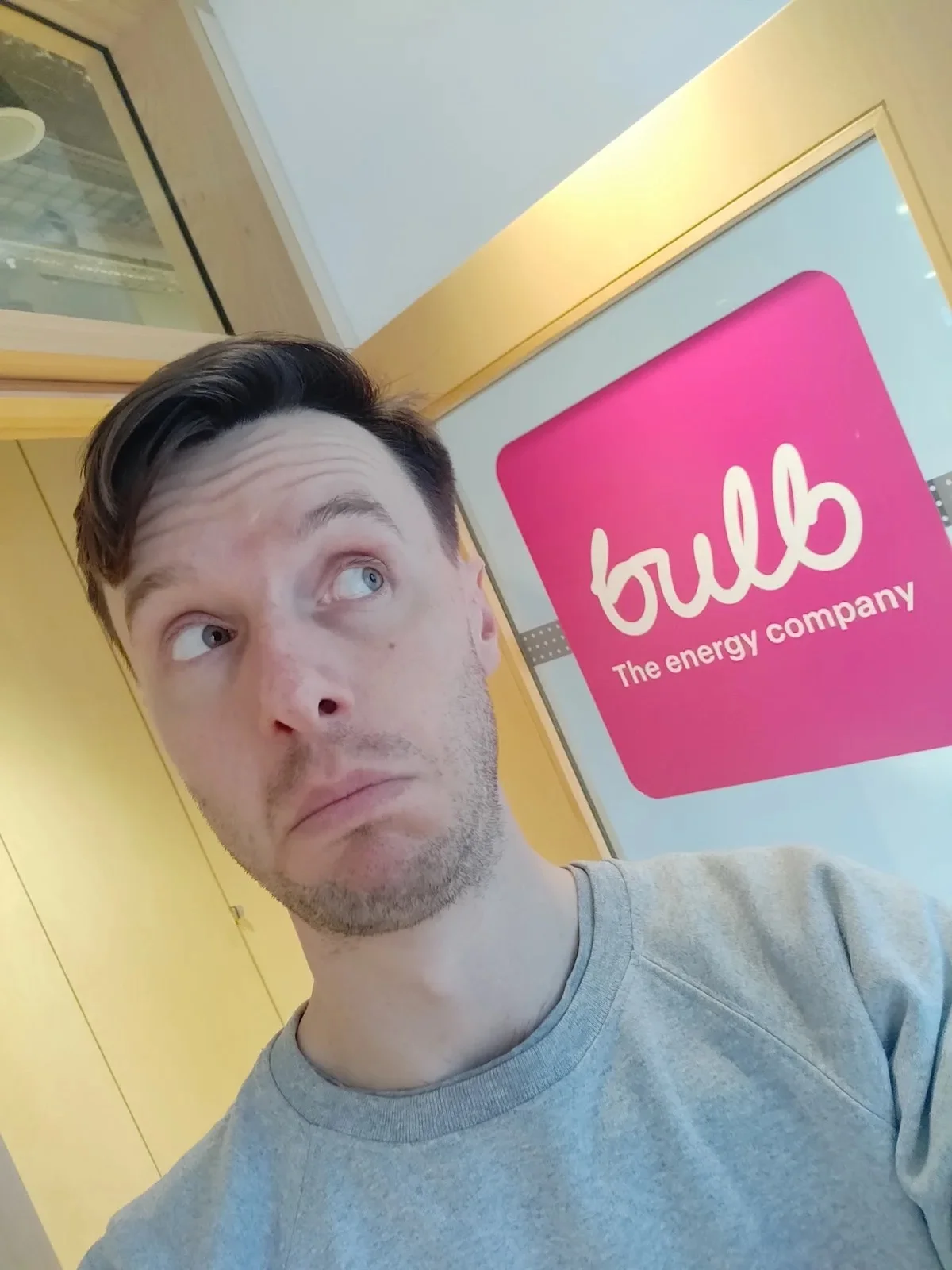 A Men's Circle visit to Bulb Energy, pictured beside the company logo
